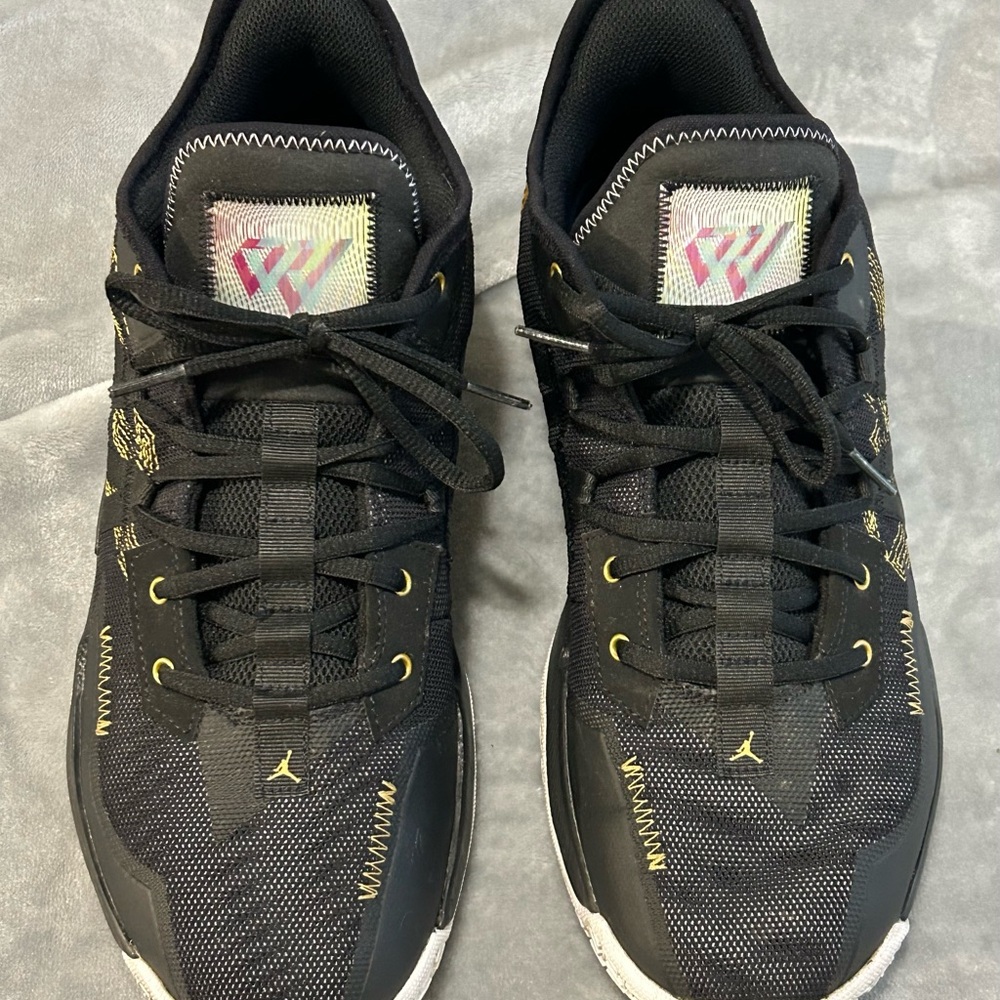 Jordan Black and Gold Sneakers with Textured Design